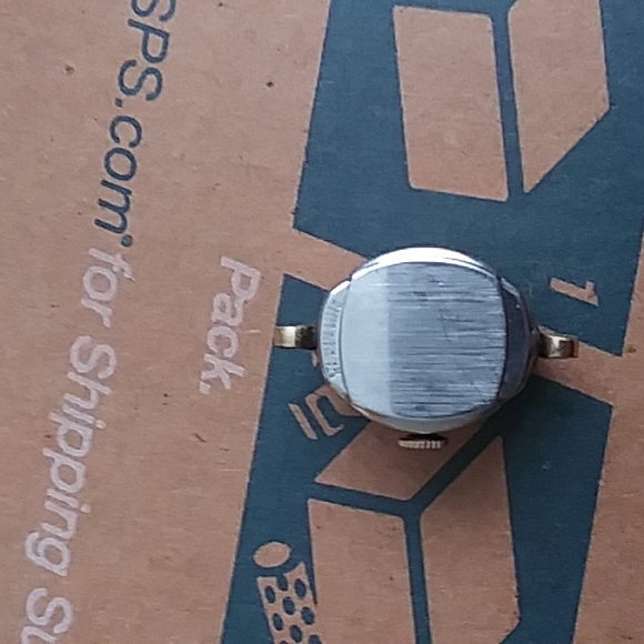 A vintage benrus 10k r.g.p. bezel watch face no band